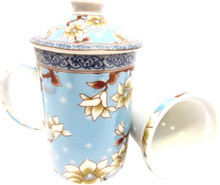 Teiera in porcellana blu chiaro con fiori bianchi