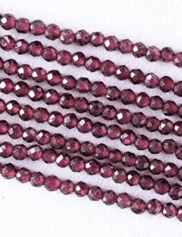 Filo di Perle Rotonde Facettate Granato Rosso AA 3 mm