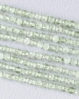 Perline sfaccettate di Prehnite AA da 3 mm su filo da 40 cm