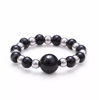 Anello in argento con perla e tormalina nera