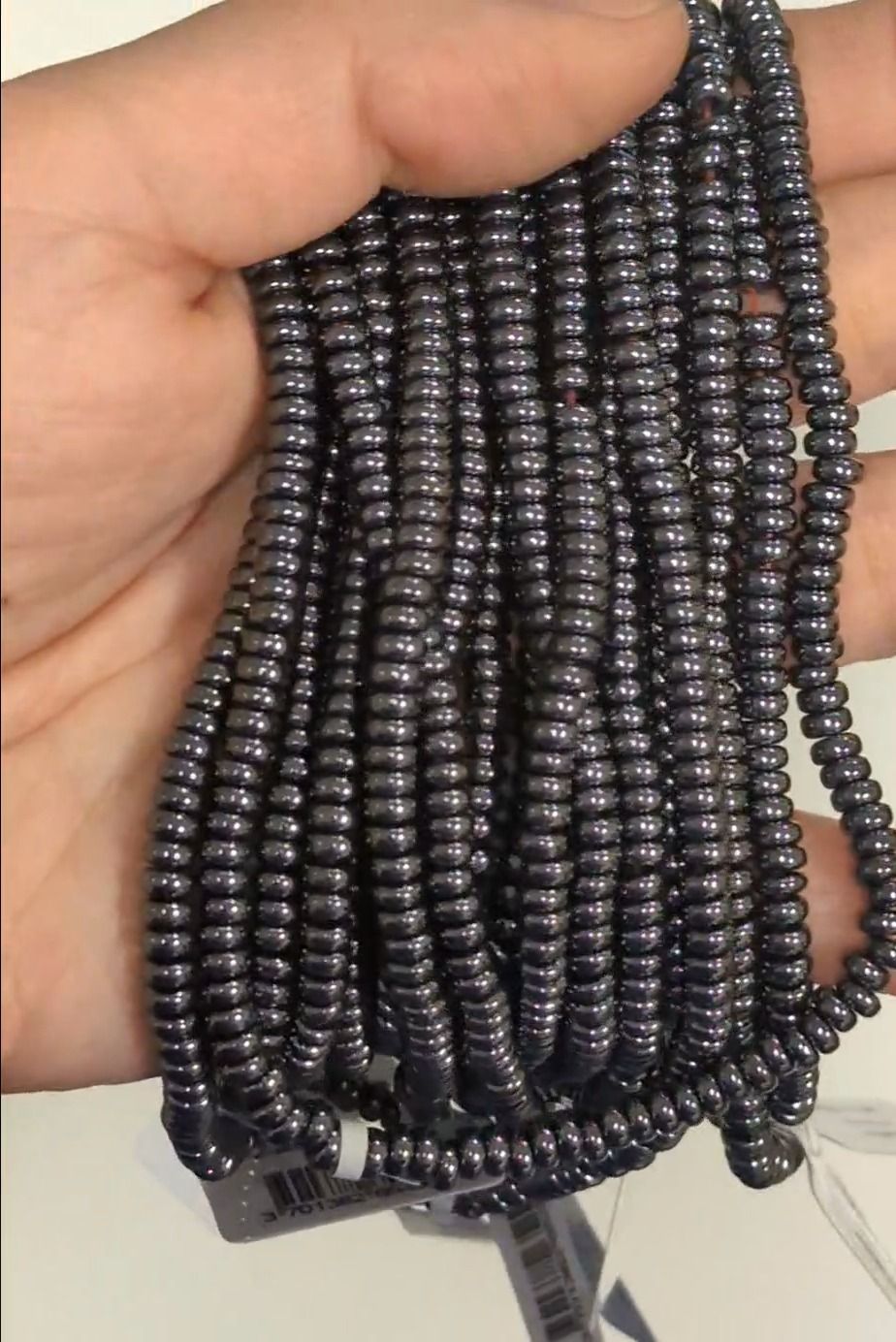 Perline distanziatrici cilindriche corte in ematite – 4×2 mm