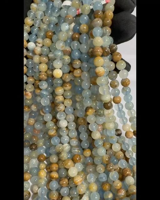 Miscela di calcite blu AA 6-7mm su filo da 40 cm
