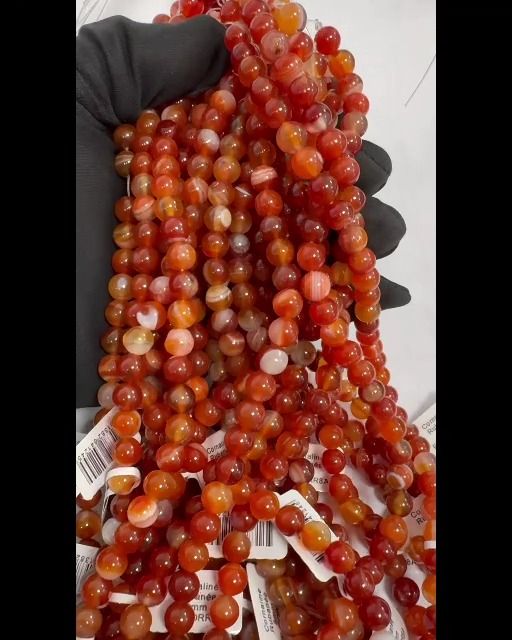 Perline A con nastro di corniola da 8 mm su filo da 40 cm