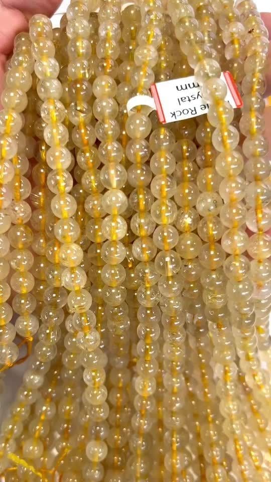 Perle di cristallo di rocca rutile A+ da 7 mm su filo da 40 cm