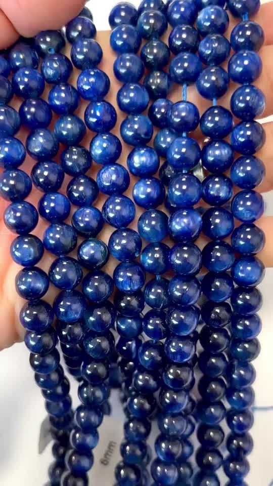 Perle di cianite blu AA riscaldate da 8 mm su un filo da 40 cm