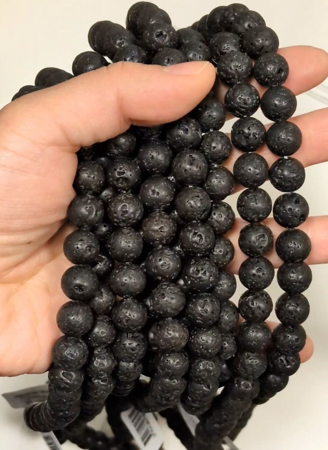 Perline di pietra lavica A da 10mm su filo da 40cm