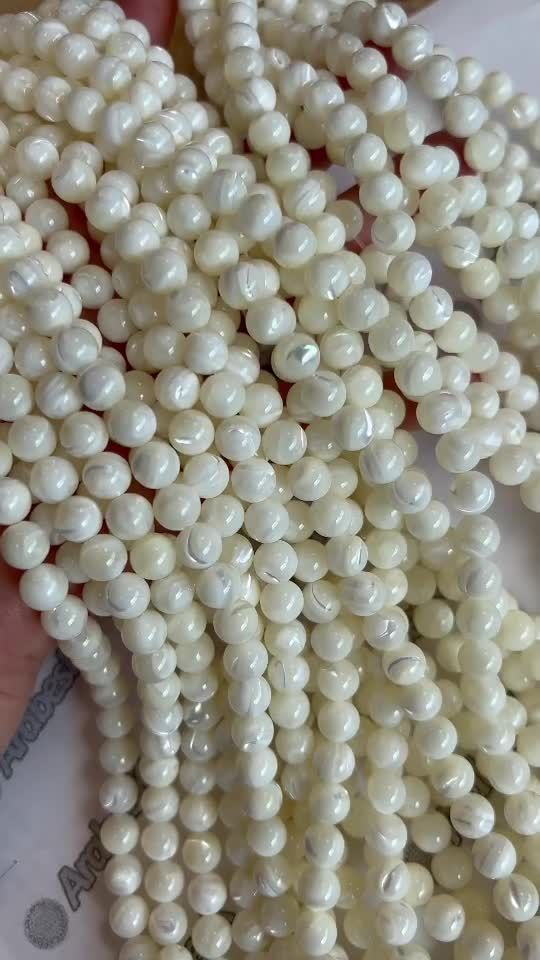 Perle di madreperla bianca A da 8 mm su un filo da 40 cm